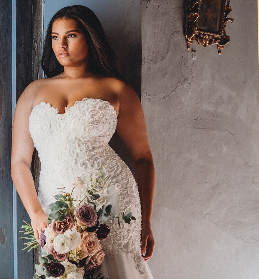Brunette plus size bride in a white gown