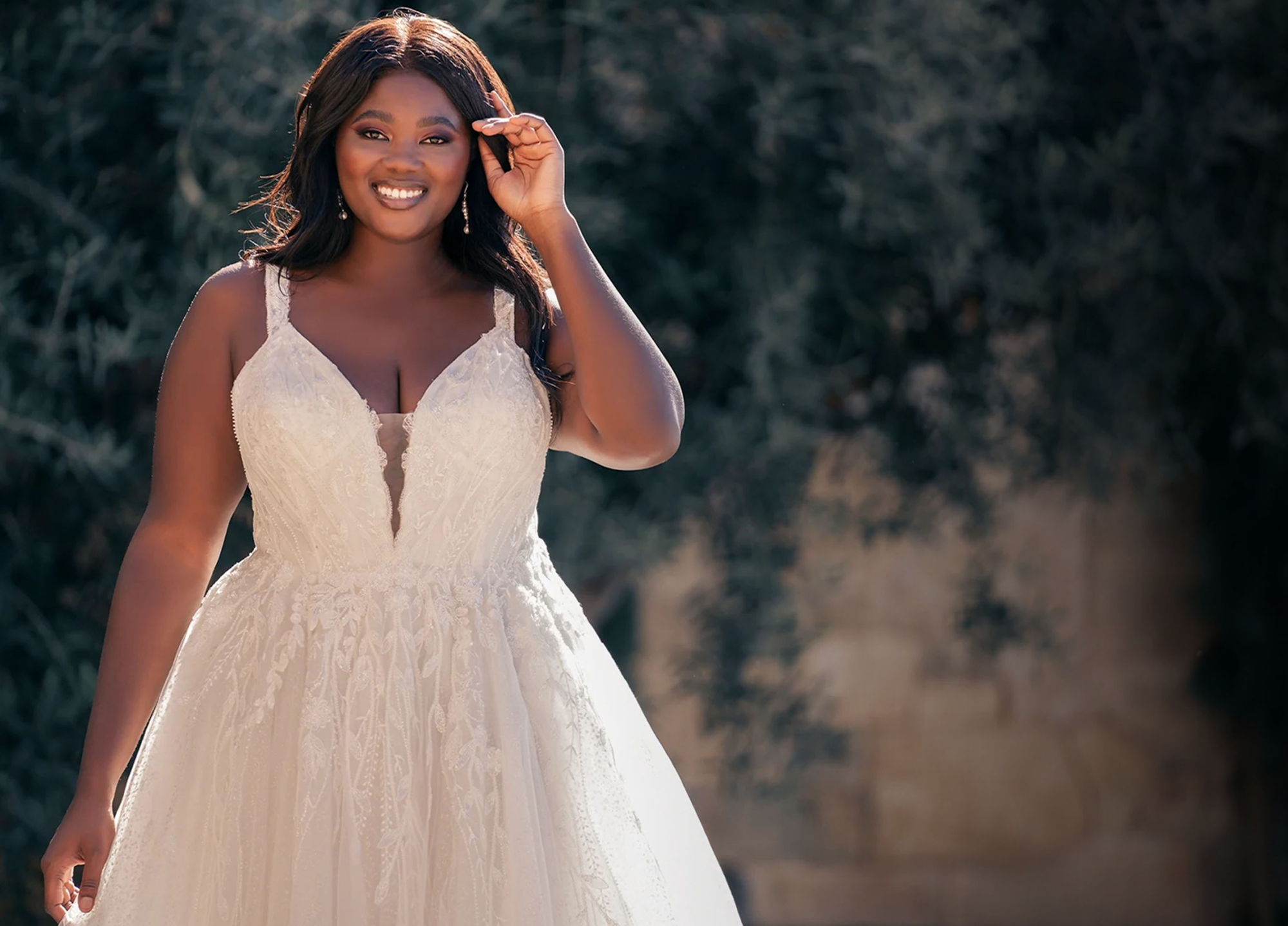 Brunette plus size bride in a white gown