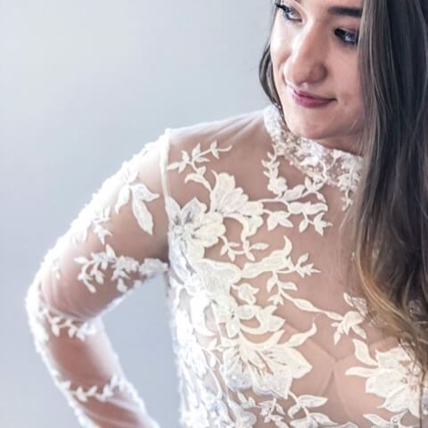 Model wearing a white gown 2